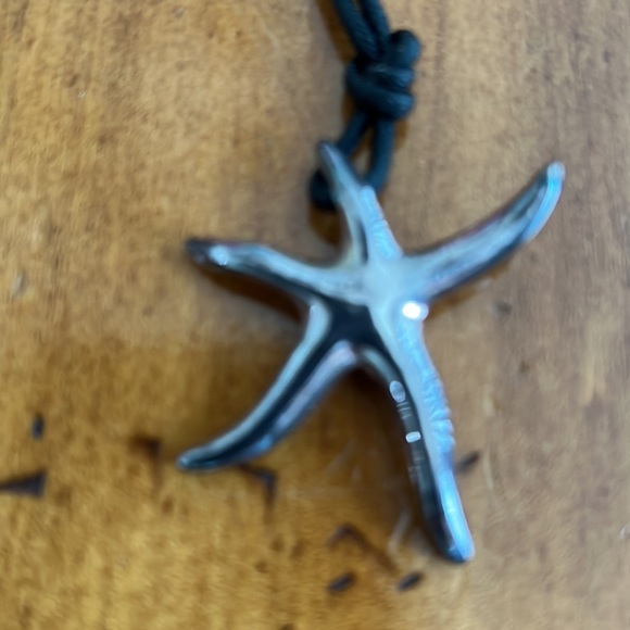 Sterling silver star pendent on black cord necklace. - Picture 4 of 5